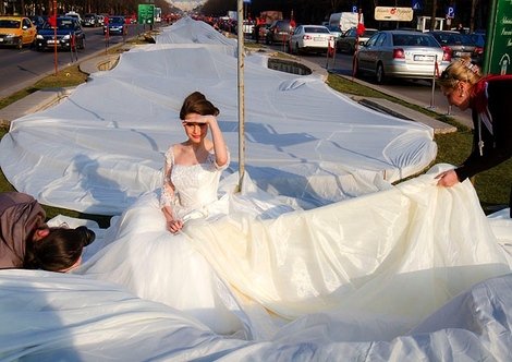 Wedding Dress is almost 2 miles long! 2 mile dress - Bella Ballroom